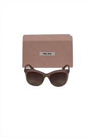 Current Boutique-Miu Miu - Beige Translucent Frames w/ Brown Lenses