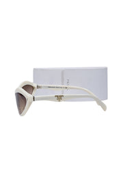 Current Boutique-Prada - Ivory Elongated Cat Eye Sunglasses