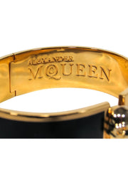 Current Boutique-Alexander McQueen - Black & Gold Bracelet w/ Skull Clasp