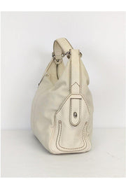 Current Boutique-Tod's - Cream Canvas Leather Purse