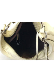 Current Boutique-Tod's - Cream Canvas Leather Purse